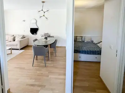 Un ou plusieurs lits dans un hébergement de l'établissement POMPIDOU - 2 Chambres avec piscine, parking, Tennis, Juan