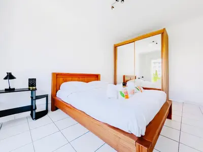 Un ou plusieurs lits dans un hébergement de l'établissement L'Oasis - 3 Pièces centre Cannes