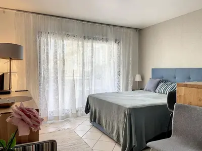 Un ou plusieurs lits dans un hébergement de l'établissement Cannes - Studio en plein cœur de Cannes