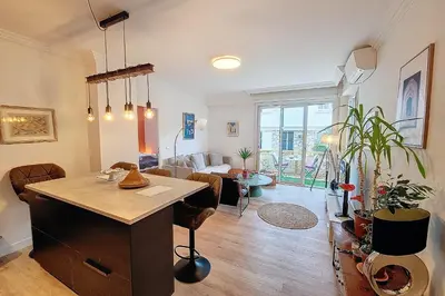 Coin salon dans l'établissement HENRI CAMILLE REAL ESTATE- Santiago - 2 bedrooms close Croisette
