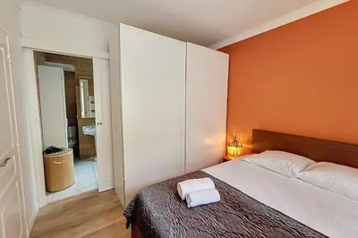 Un ou plusieurs lits dans un hébergement de l'établissement HENRI CAMILLE REAL ESTATE- Santiago - 2 bedrooms close Croisette