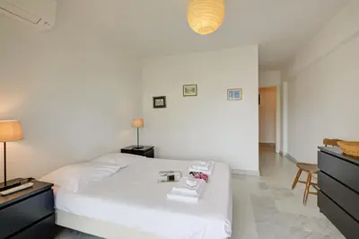 Un ou plusieurs lits dans un hébergement de l'établissement L'Ermitage - Happy Rentals