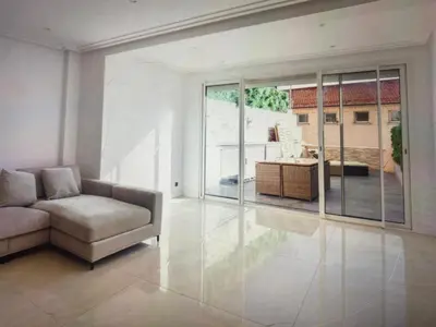 Coin salon dans l'établissement Appartement Avec Terrasse Centre-ville Croisette