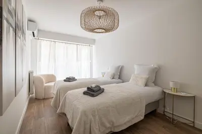 Un ou plusieurs lits dans un hébergement de l'établissement Magnificent 3room apartment quiet balcony