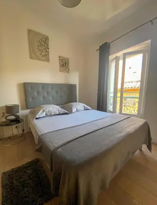 Un ou plusieurs lits dans un hébergement de l'établissement Appartement Biot Village