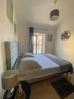 Un ou plusieurs lits dans un hébergement de l'établissement Appartement Biot Village