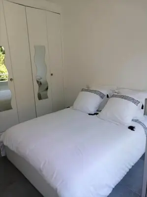 Un ou plusieurs lits dans un hébergement de l'établissement L'Orangeraie Centre Cannes Martinez, Beau F2 avec terrasse