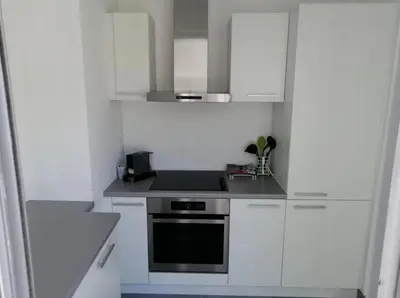 Cuisine ou kitchenette dans l'établissement L'Orangeraie Centre Cannes Martinez, Beau F2 avec terrasse