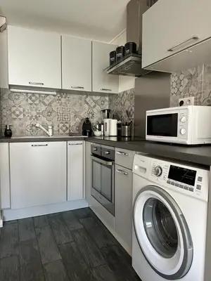 Cuisine ou kitchenette dans l'établissement Le bijou plage