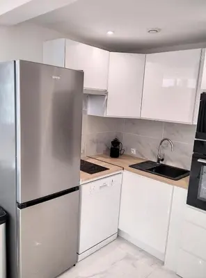 Cuisine ou kitchenette dans l'établissement Résidence Graziella Appartement 99