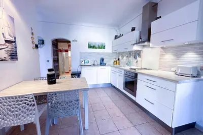 Cuisine ou kitchenette dans l'établissement Appartement dans la villa 