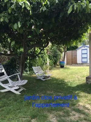 Jardin de l'établissement Appartement dans la villa 