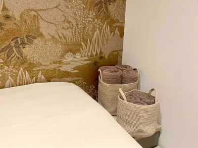 Un ou plusieurs lits dans un hébergement de l'établissement Au cœur du viel Antibes - Cosy appartement