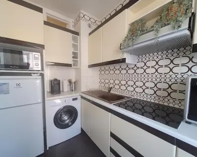 Cuisine ou kitchenette dans l'établissement LE LINDOS T2 PROCHE PLAGES