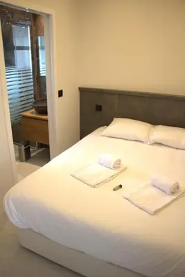 Un ou plusieurs lits dans un hébergement de l'établissement 06AO - Superbe appartement avec vue mer exceptionnelle