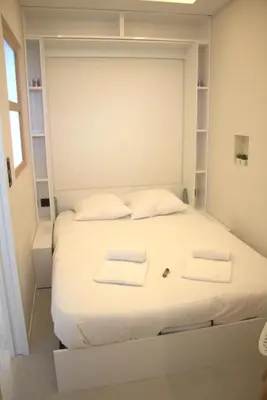 Un ou plusieurs lits dans un hébergement de l'établissement 06AO - Superbe appartement avec vue mer exceptionnelle
