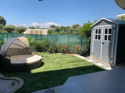 Jardin de l'établissement Joli studio climatisé avec Jardin dans résidence avec piscine