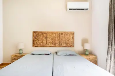 Un ou plusieurs lits dans un hébergement de l'établissement Villa Inti - piscine, jardin privé & barbecue