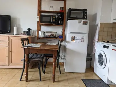 Cuisine ou kitchenette dans l'établissement Studio Calme Dernier Etage
