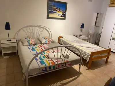 Un ou plusieurs lits dans un hébergement de l'établissement Villa Riviera