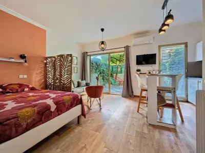Un ou plusieurs lits dans un hébergement de l'établissement Studio cosy à 30 mètres de la plage