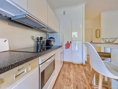 Cuisine ou kitchenette dans l'établissement Studio cosy à 30 mètres de la plage