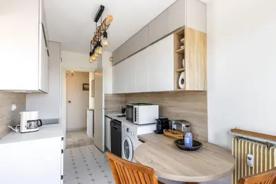 Cuisine ou kitchenette dans l'établissement Appartement Orangerie - Welkeys