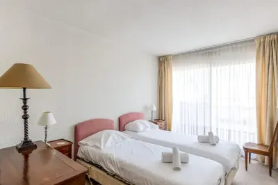 Un ou plusieurs lits dans un hébergement de l'établissement Appartement Orangerie - Welkeys