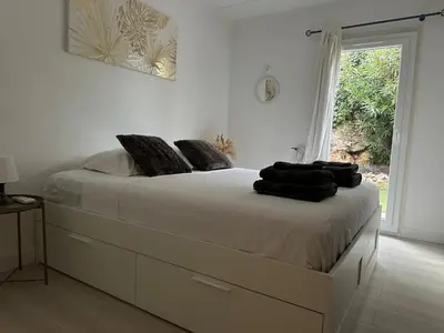 Un ou plusieurs lits dans un hébergement de l'établissement Jolie maison familiale