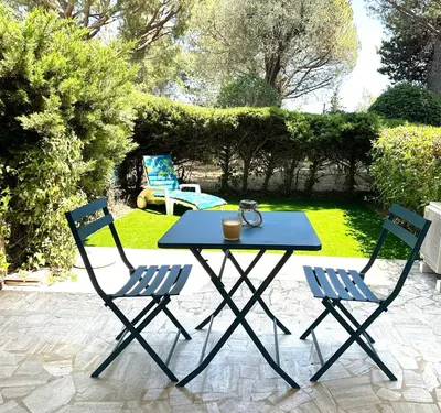 Jardin de l'établissement Studio climatisé avec piscine-tennis-parking