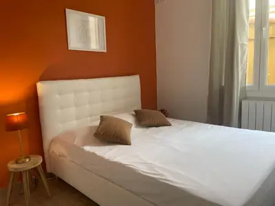 Un ou plusieurs lits dans un hébergement de l'établissement Luciana Cannes avec parking - proximité centre croisette -gare -plage