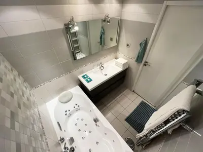 Salle de bains dans l'établissement Appartement 84m² avec 2 parkings privatifs