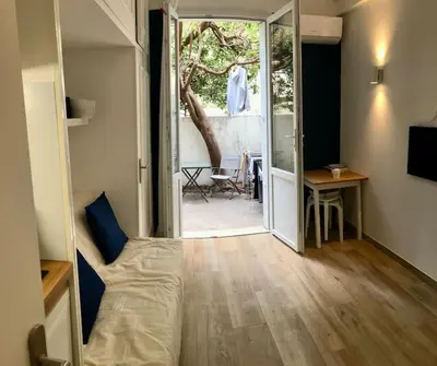 Un ou plusieurs lits dans un hébergement de l'établissement Studio bord de mer, Croisette, Cannes