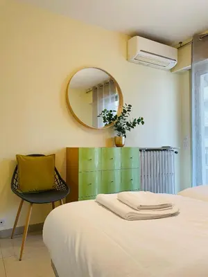 Un ou plusieurs lits dans un hébergement de l'établissement Bel appartement Centre ville, mer, Croisette