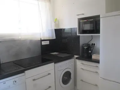 Cuisine ou kitchenette dans l'établissement Studio à 10 min de la croisette et de la mer et 5 min de la gare