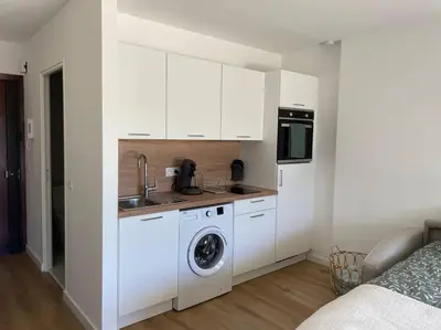 Cuisine ou kitchenette dans l'établissement Studio La Douce