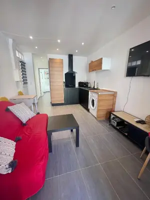Cuisine ou kitchenette dans l'établissement Cosy appartement - Vieux port