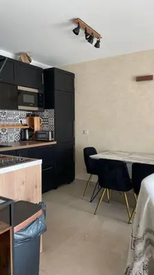 Cuisine ou kitchenette dans l'établissement magnifique appartement centre plage