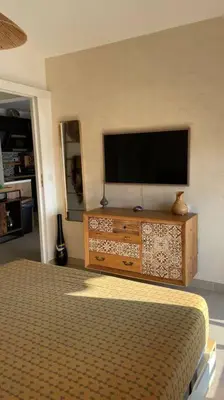 Télévision ou salle de divertissement dans l'établissement magnifique appartement centre plage