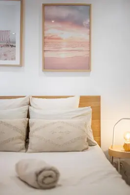 Un ou plusieurs lits dans un hébergement de l'établissement Appartement bord de mer « La Petite Ma-Line »
