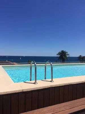 Piscine de l'établissement magnifique studio à 2 mn de la mer ou située à proximité
