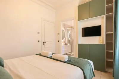 Un ou plusieurs lits dans un hébergement de l'établissement Luxueuse Villa 7 chambres avec piscine - Cannes