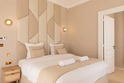 Un ou plusieurs lits dans un hébergement de l'établissement Luxueuse Villa 7 chambres avec piscine - Cannes