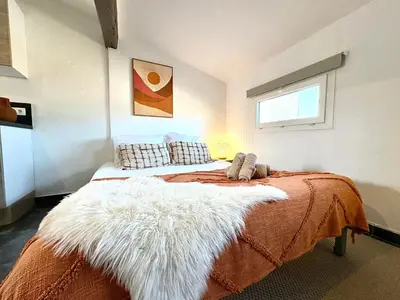 Un ou plusieurs lits dans un hébergement de l'établissement Appartements climatisés - Vieil Antibes