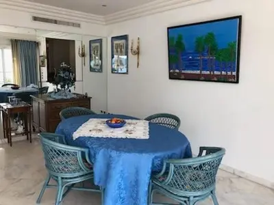 Télévision ou salle de divertissement dans l'établissement Appartement Miramar Cannes Croisette