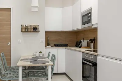 Cuisine ou kitchenette dans l'établissement Cozy renovated apartment - 1BR4p - Hyper Center