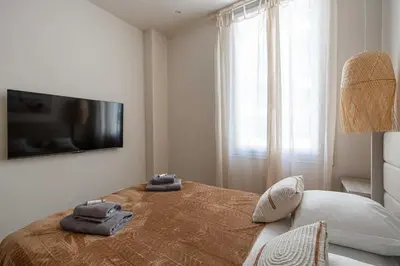 Un ou plusieurs lits dans un hébergement de l'établissement Cozy renovated apartment - 1BR4p - Hyper Center