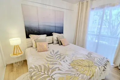 Un ou plusieurs lits dans un hébergement de l'établissement Ref FLEUR - Palmes d'Or Properties