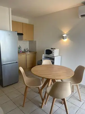 Cuisine ou kitchenette dans l'établissement Résidence Graziella Studio 605