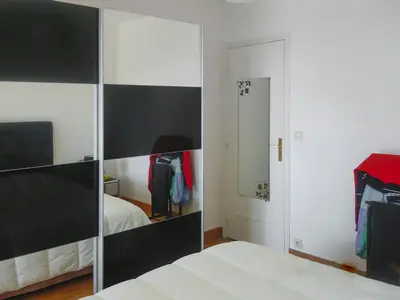 Un ou plusieurs lits dans un hébergement de l'établissement Appartement charmant à Villeneuve-Loubet 55 m² avec vue mer